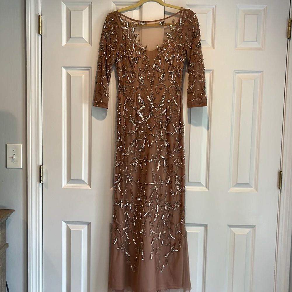 Dusty rose color (is missing some sequins but not noticeable)